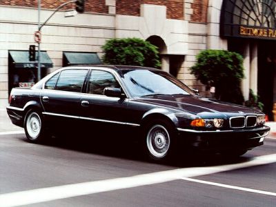 Black luxury sedan with elongated body and classic BMW styling