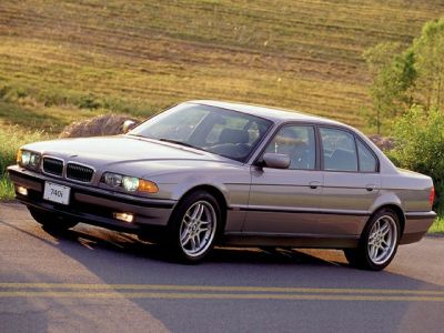 Front side view of a 1998 luxury long wheelbase sedan with alloy wheels.