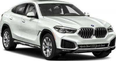 Front and side view of white luxury SUV with signature grille and sculpted body