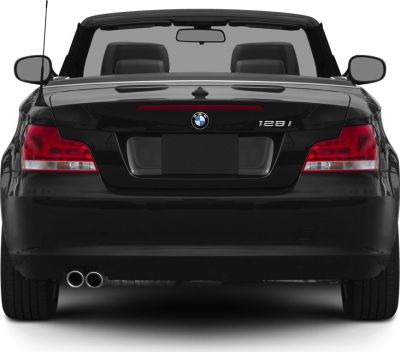 Convertible rear with dual exhaust, tail lights, and badge