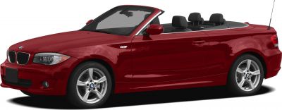 Red convertible car with open roof and sporty alloy wheels