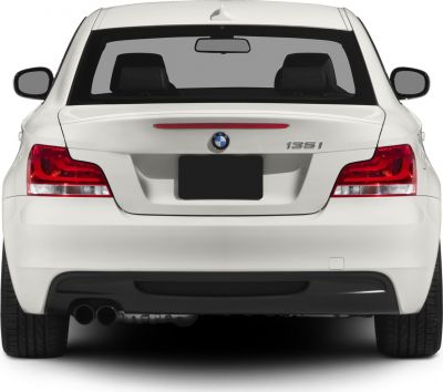 Rear view with taillights and dual exhaust pipes