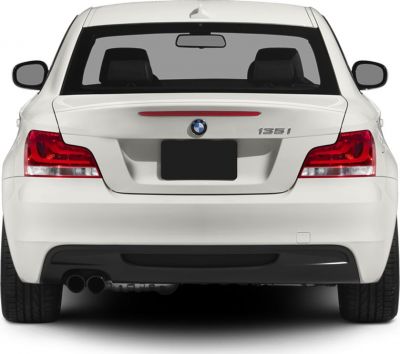 Rear view with taillights and dual exhaust pipes