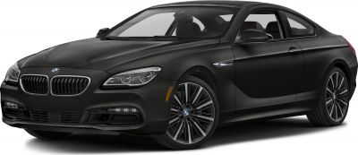 Front angled view of sleek headlights and multi-spoke wheels on a black luxury coupe.
