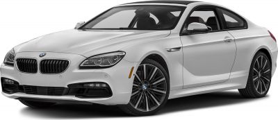 White luxury coupe with aggressive headlights and multi-spoke alloy wheels