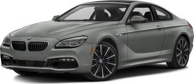 Front side view of sleek luxury coupe with distinct grille and headlights
