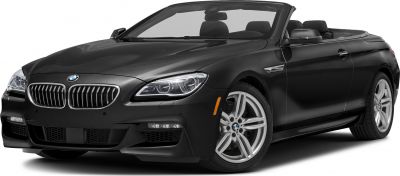 Front-side view of convertible with prominent headlights and alloy wheels
