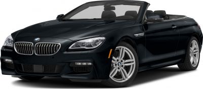 Front view showing sleek headlights and grille of a luxury convertible