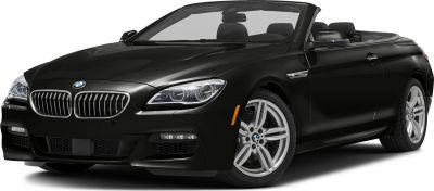 Front view of a convertible with open top, kidney grille, and alloy wheels