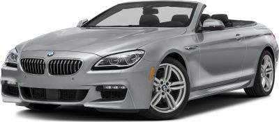 Front side view of modern convertible with distinctive grille and headlights