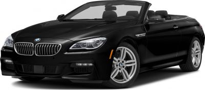 Front view of convertible with distinctive headlights and alloy wheels