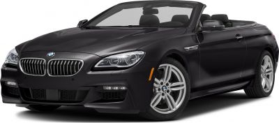 Front angle view of a sleek convertible with LED headlights and alloy wheels