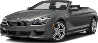 Front view of convertible with open roof and distinctive headlights