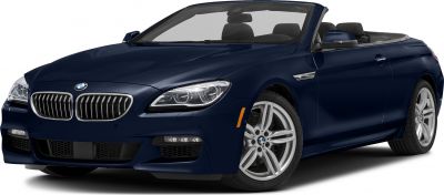 Front view of sporty luxury convertible with LED headlights and prominent grille