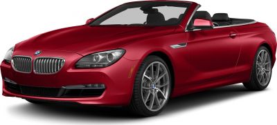 Front side view with distinct headlights and alloy wheels