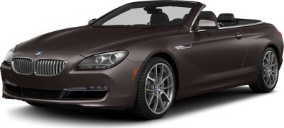 Front-side view of convertible featuring dual headlights and alloy wheels.