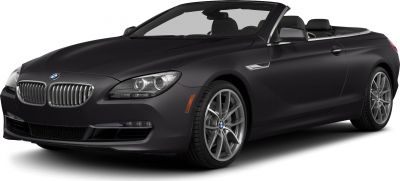 Sleek front-side view of a black convertible with alloy wheels and sharp headlights.