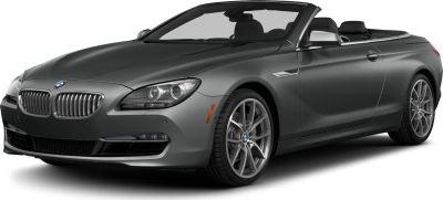 Front side view of a luxury convertible with alloy wheels and detailed headlights