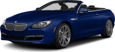 Front-side view of a blue convertible featuring alloy wheels and modern headlights