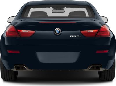 Rear view with distinctive taillights and dual exhausts