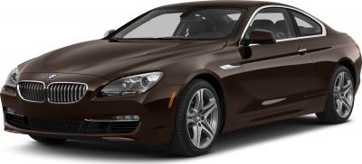 Front-side view of a sleek luxury coupe with distinctive grille and alloy wheels