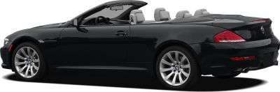Side profile of black BMW convertible with open roof and alloy wheels